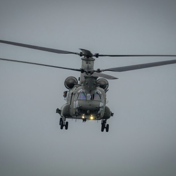 Australian Chinook Helicopter Refuels Abrams Tanks
