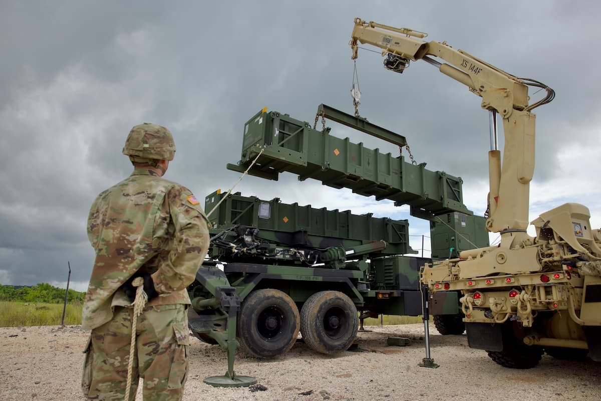 U.S. Soldiers prepare a PAC-2 missile for loading onto a Patriot system during exercise Tenacious Archer 25 at Koror International Airport, Palau, Aug. 15, 2025.
